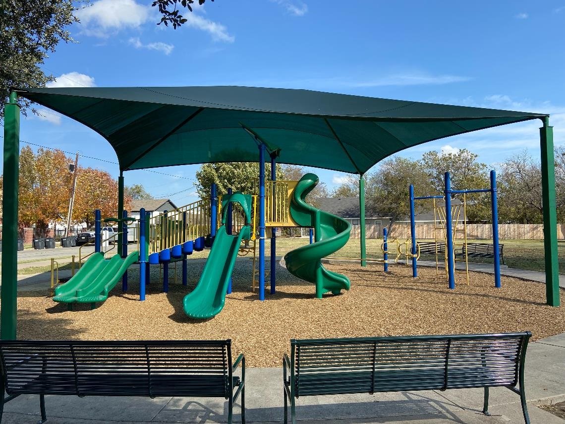 Photo of Council Acres Park playground and benches