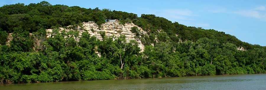 Photo of limestone cliffs, the river and Emmons Cliff overlook.