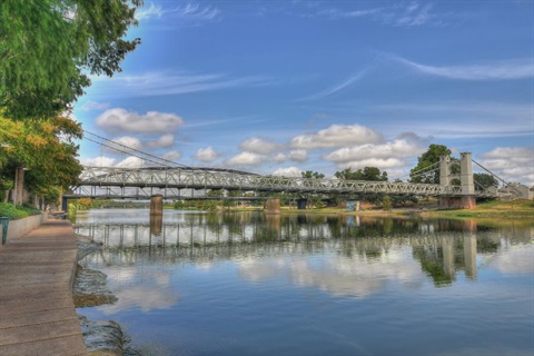 Photo of the Waco Suspension Bridge and Brazos River.