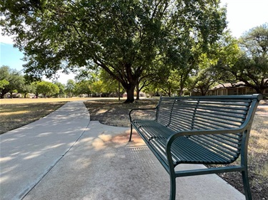 Mitchell Park walking trail and bench