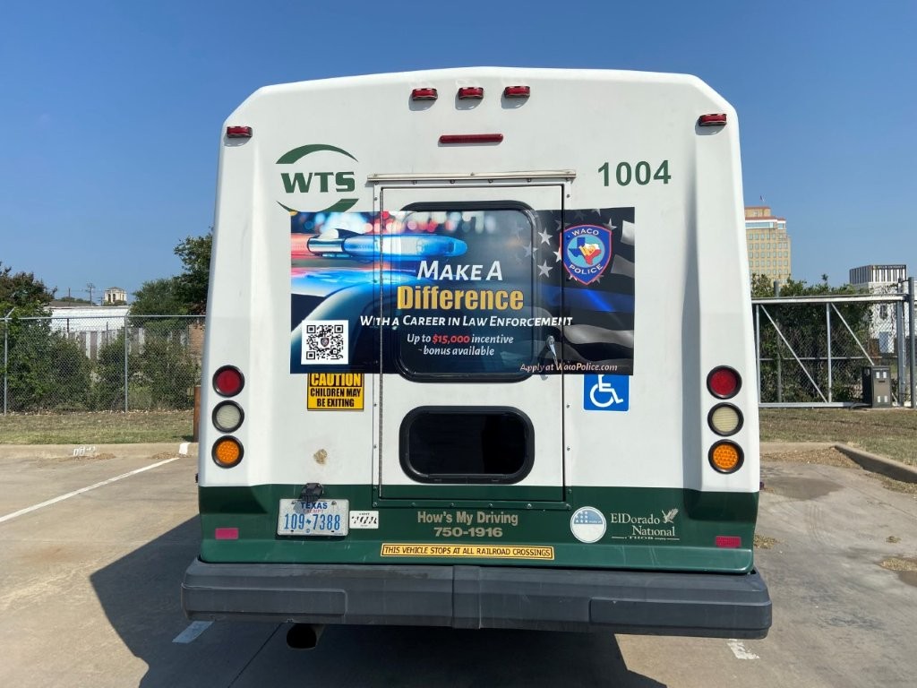 An example of a back banner ad on a rural bus