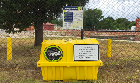 The Fats, oils, grease recycling stations are large yellow plastic boxes that are easily lifted open with barrels to accept used oils.