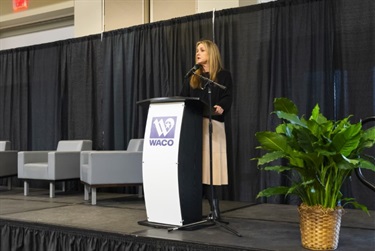 Kacey Darnell, Director of the WorkSITE addressing the audience