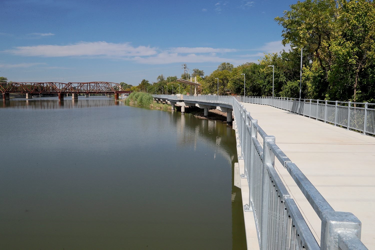 Photo of the East Riverwalk with the Brazos River to the side.