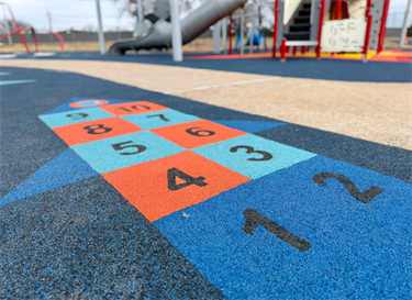 Rocket ship hopscotch at the Bledsoe-Miller STEAM Center playground.