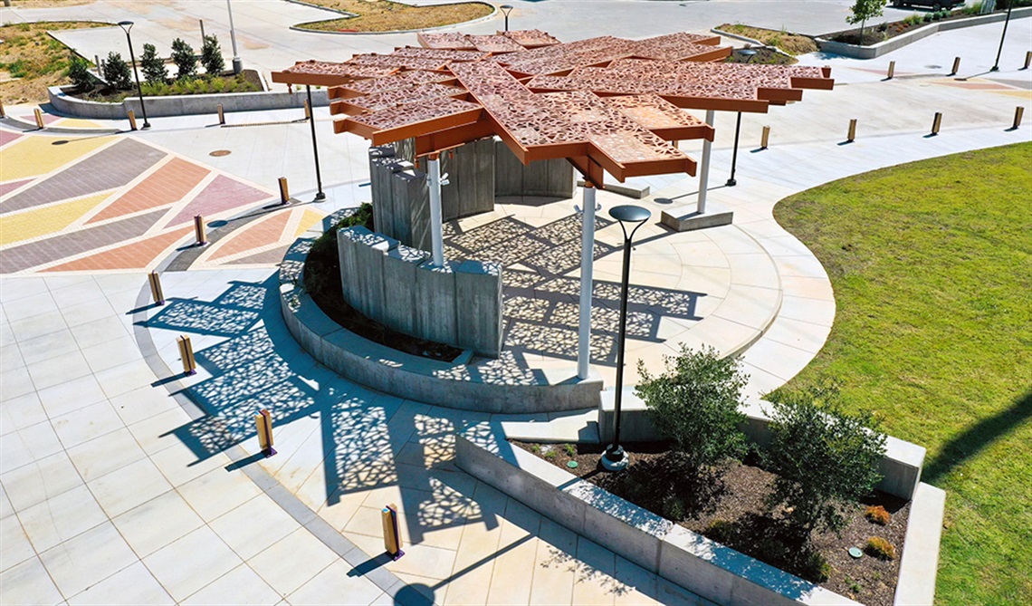 Aerial view of the Bridge Street amphitheater and surrounding grass and paved areas.