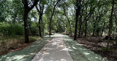Paved nature trail at new China Spring Park. 