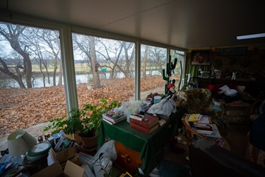 View of the back yard and river from the sun room