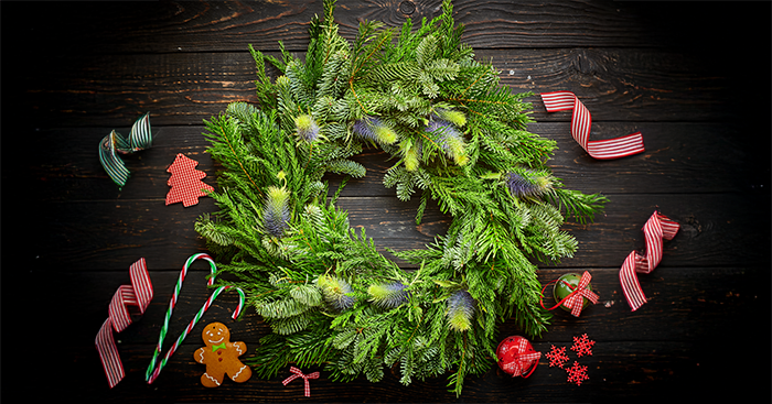 Green Christmas wreath with the decorations removed