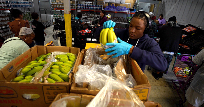 Volunteer working at a food pantry