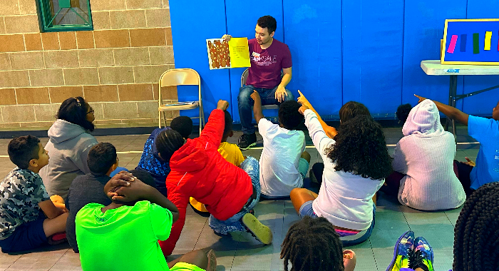 Librarian reading to kids