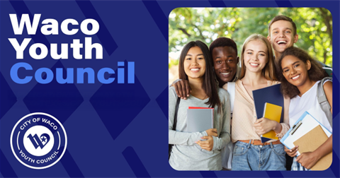 Two teen girls at a blue Waco Youth Council booth
